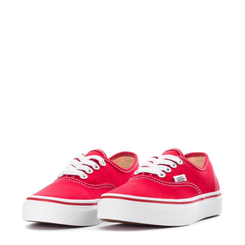 Kids red canvas sneakers, lace-up front with white toe cap and rubber sole