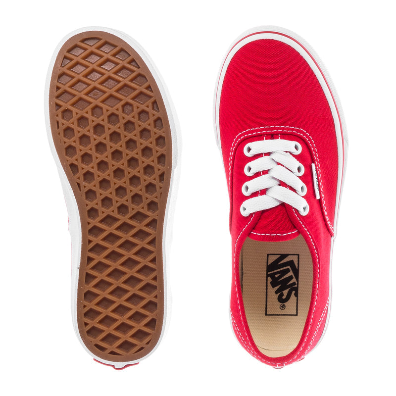 Kids red sneakers with white outsole and Vans traction tread underside