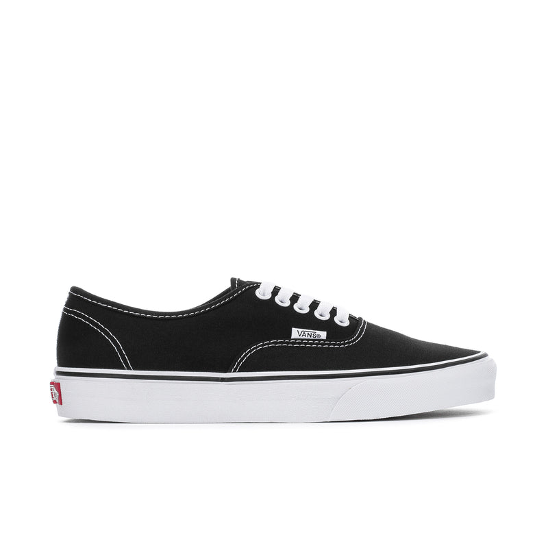 Men's black canvas sneakers with white stitching, white laces, and logo patch