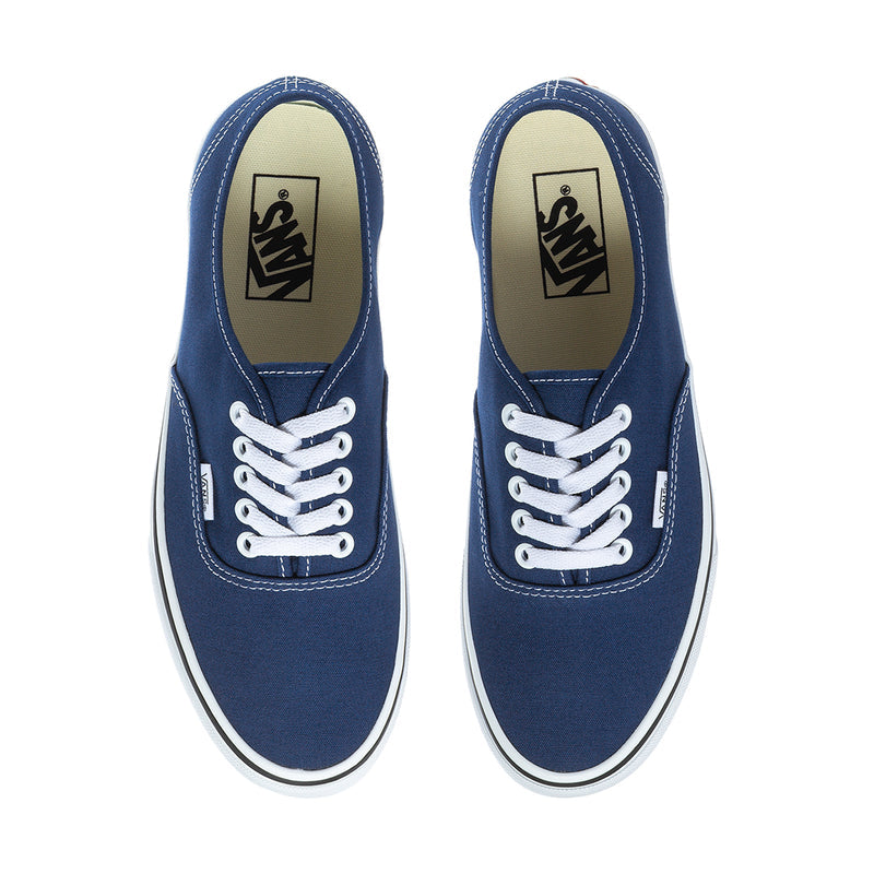 Men's blue canvas low-top sneakers with white laces and VANS logo on tongue