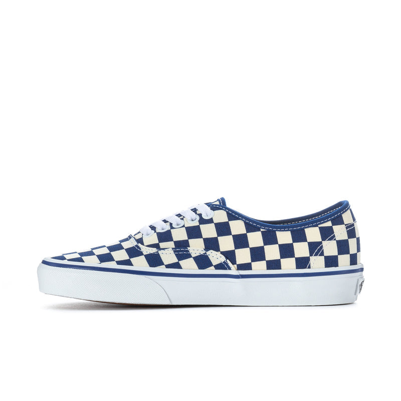 Low-top checkerboard sneakers with blue and white pattern and white rubber sole