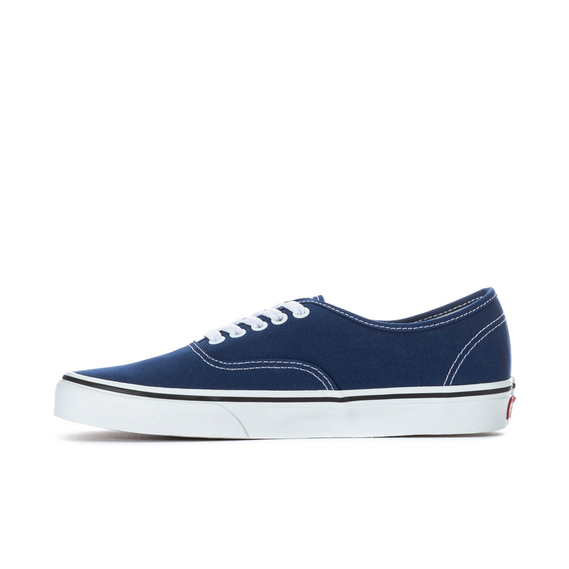 Men's blue canvas low-top sneakers side view with white laces and sole