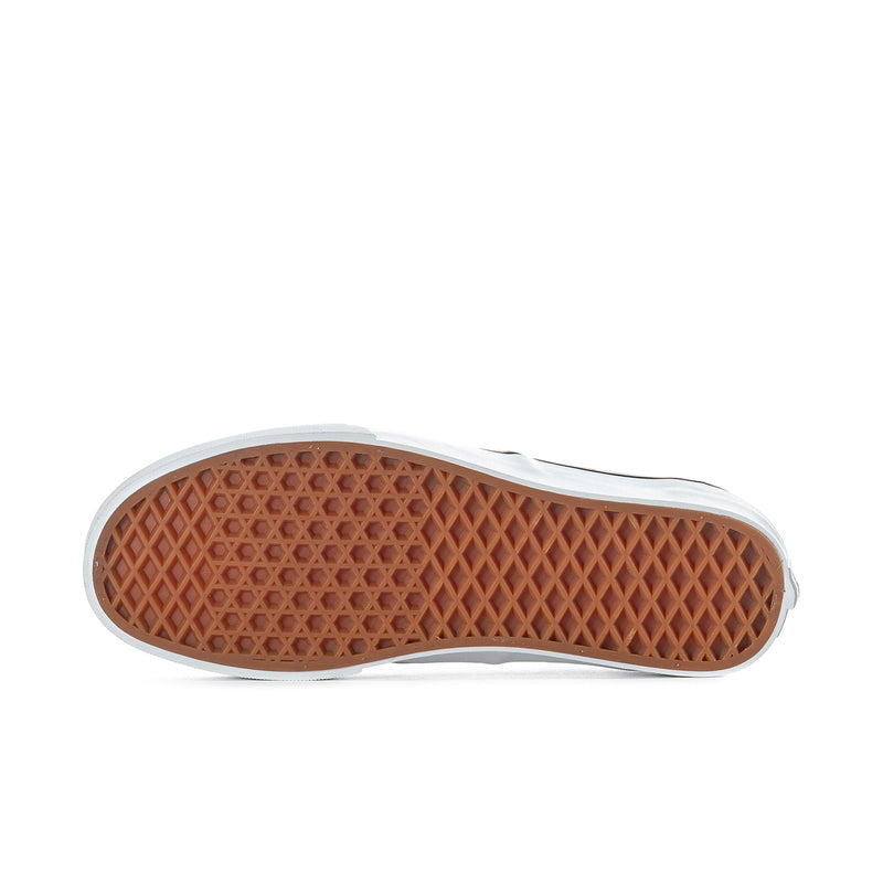 Men's sneaker outsole in brown with textured waffle tread and white edge