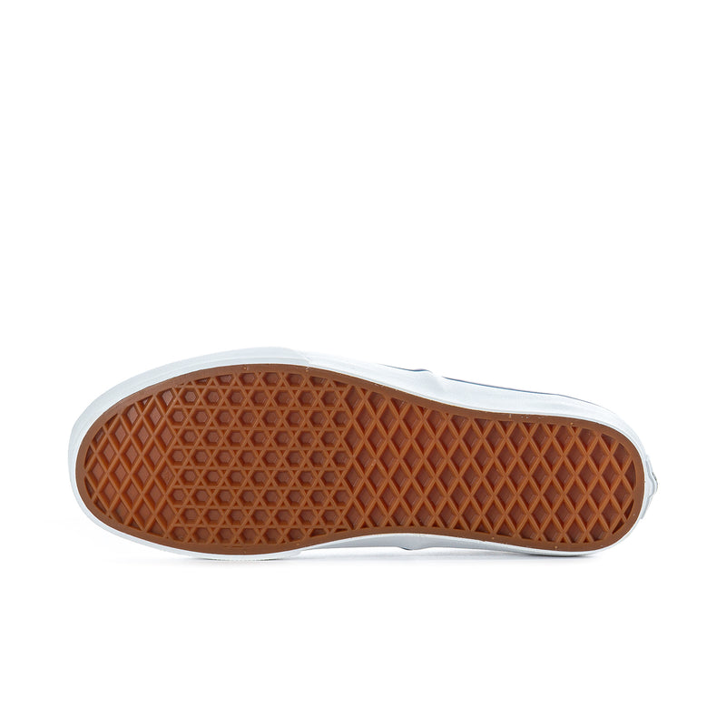 Checkerboard sneakers outsole with brown rubber tread and white sidewall