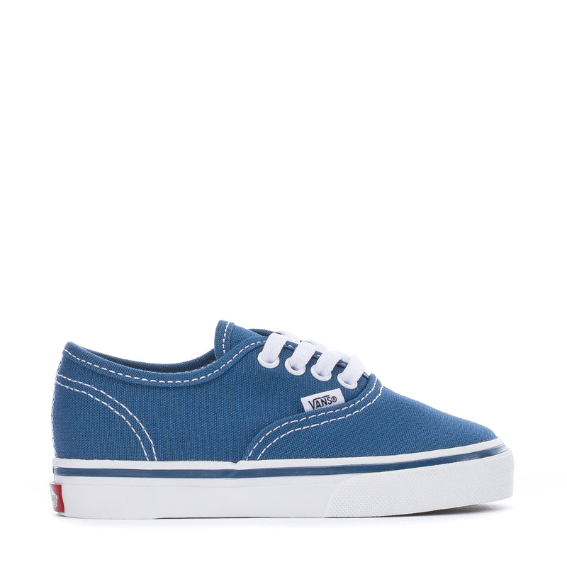 Toddler navy canvas sneakers with white stitching, lace eyelets, and white rubber sole