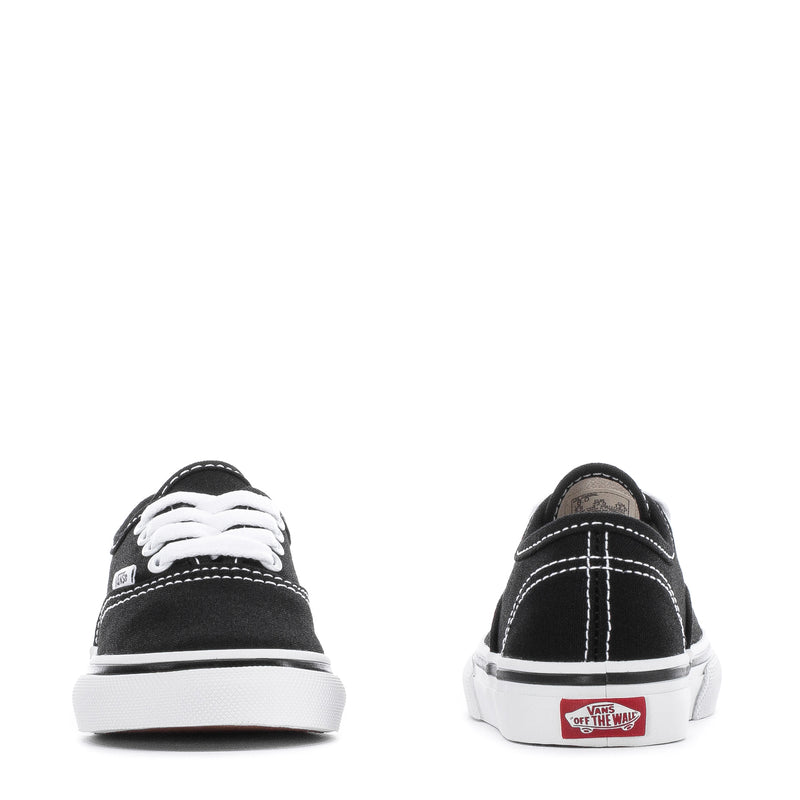 Toddler black sneakers, heel view with white midsoles and 'Off the Wall' mark