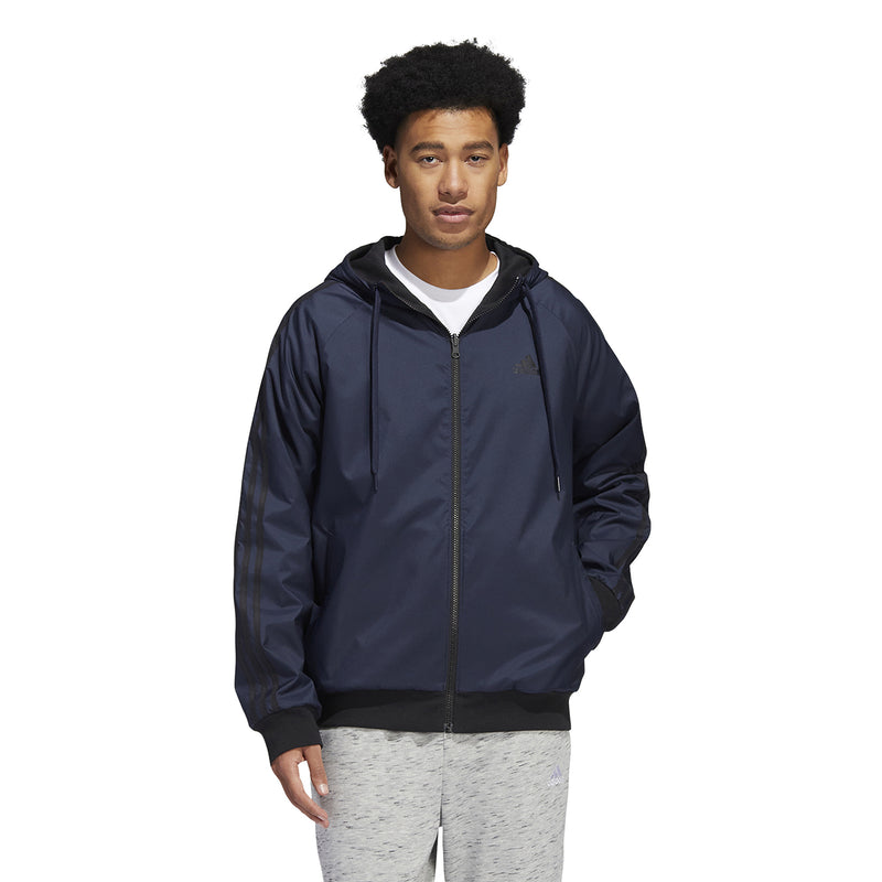 Men's navy hooded zip jacket worn over a white shirt