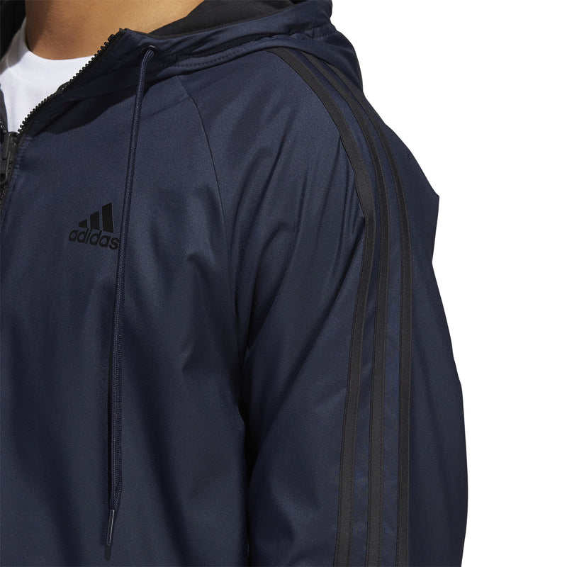 Navy hooded zip jacket close-up with drawcords and side logo