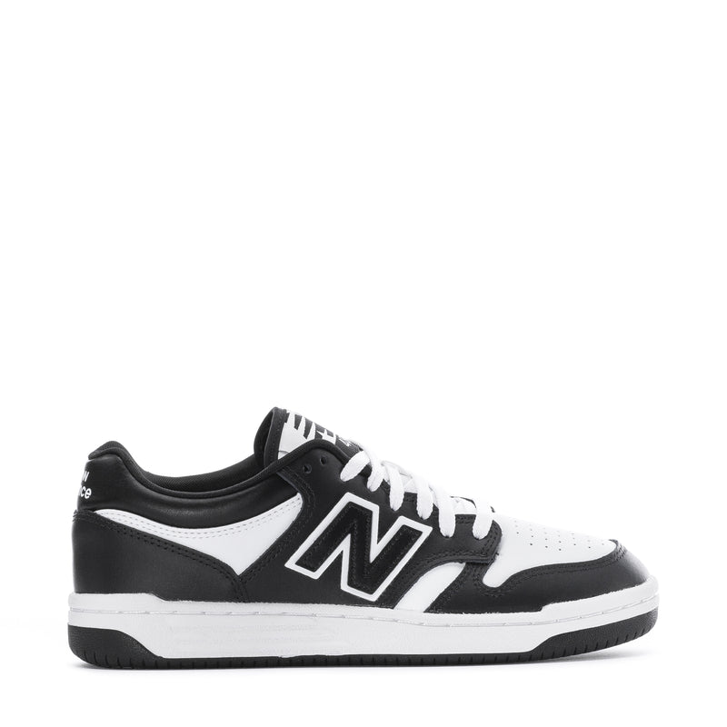 Youth New Balance sneakers, black and white with N logo and lace-up