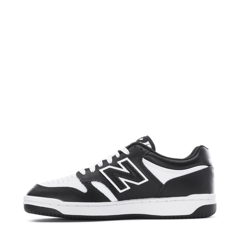 Youth New Balance sneakers, white toe and black sides with large N logo