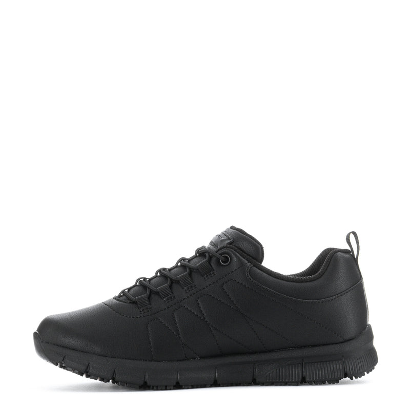 Women's black low-top lace-up sneakers, angled side view with padded collar