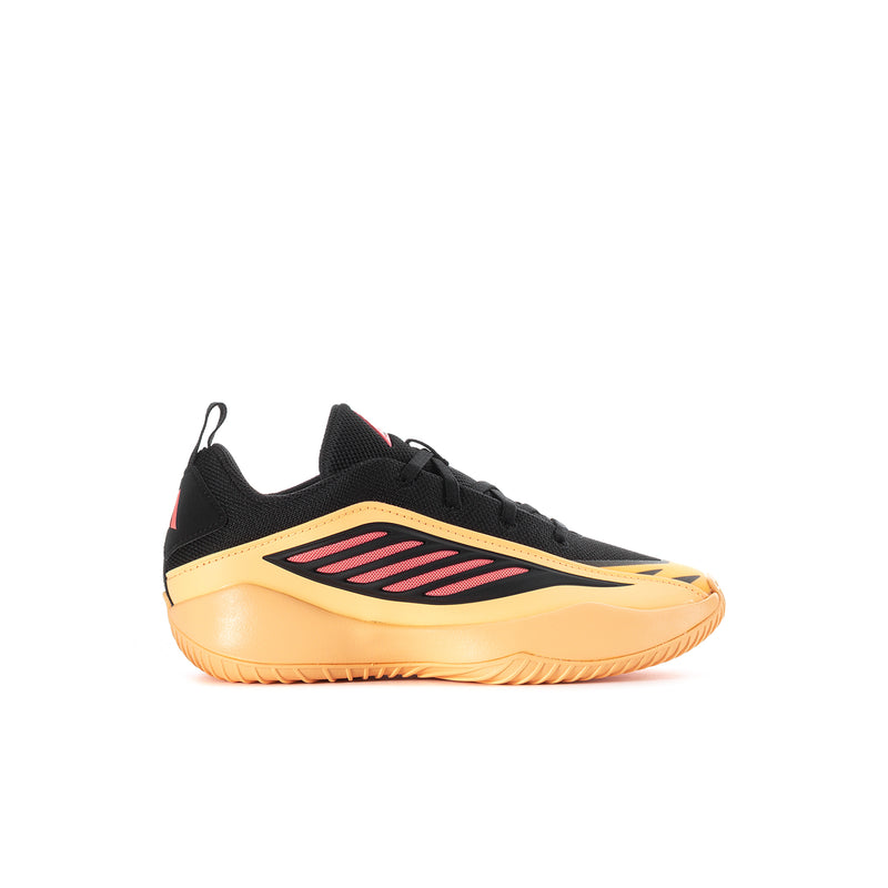 Kids black athletic shoe with peach side panels and pink stripe logo