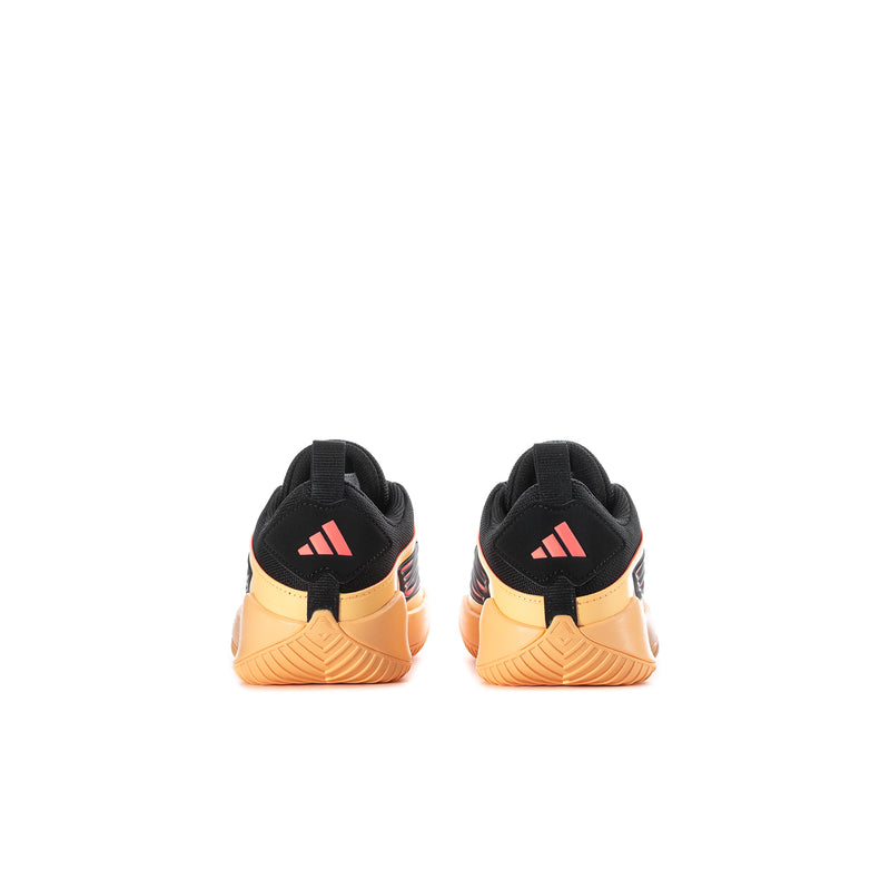 Kids black sneakers with peach heel caps and red logo on back