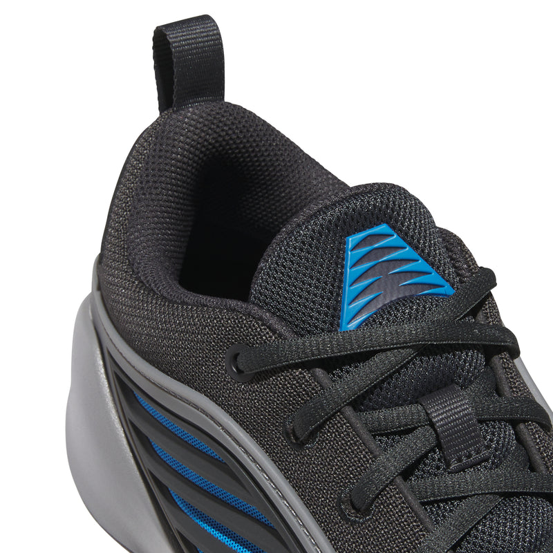 Close-up of mens sneaker upper: dark mesh, blue stripe detail, and lace eyelets
