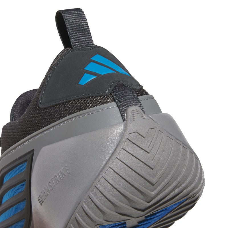 Close-up of mens heel and sole: dark upper, blue accents, and IMAGATIVE PRIME branding