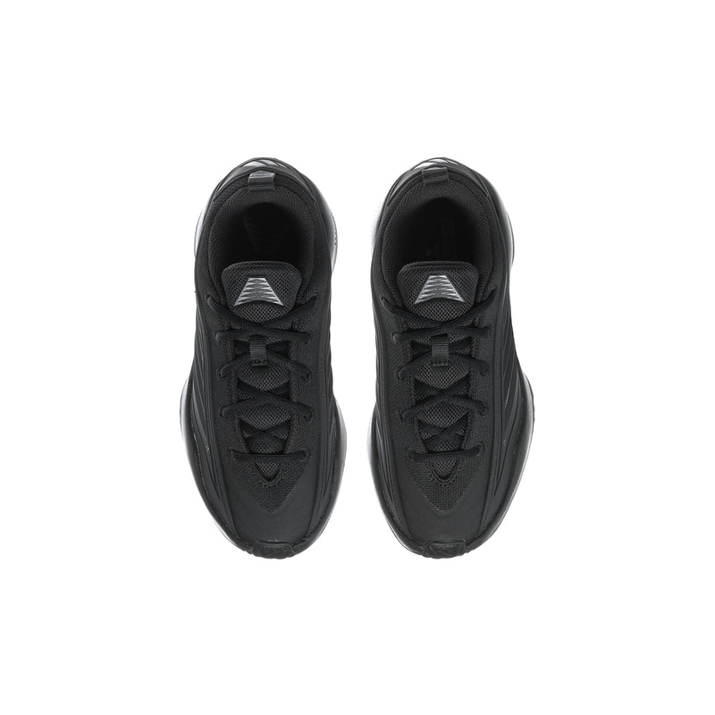 Youth black athletic sneakers, view of tongues and laces with molded eyestay panels