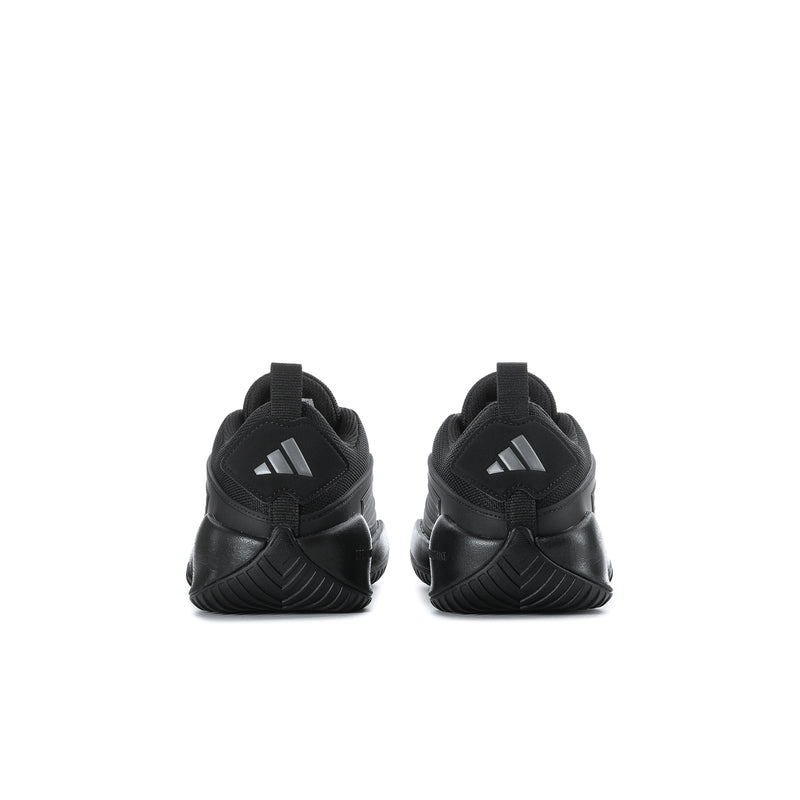 Youth black athletic sneakers, rear view with heel tab and textured cushioning design