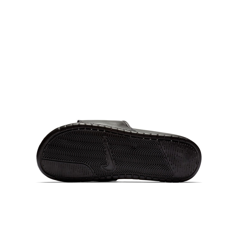 Black Nike slide outsole with textured tread