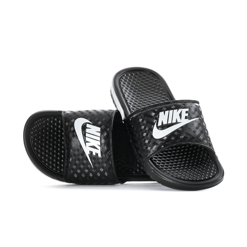 Black Nike slide sandals with checker-texture straps and white logo