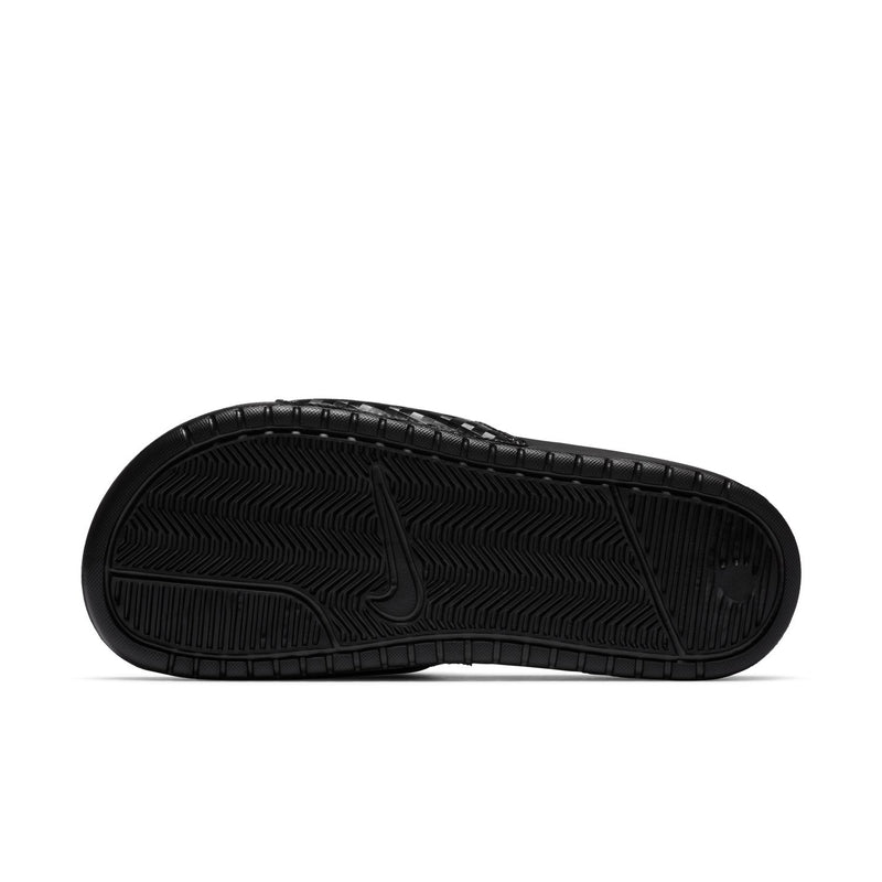 Black rubber outsole for Nike slide sandals with tread pattern