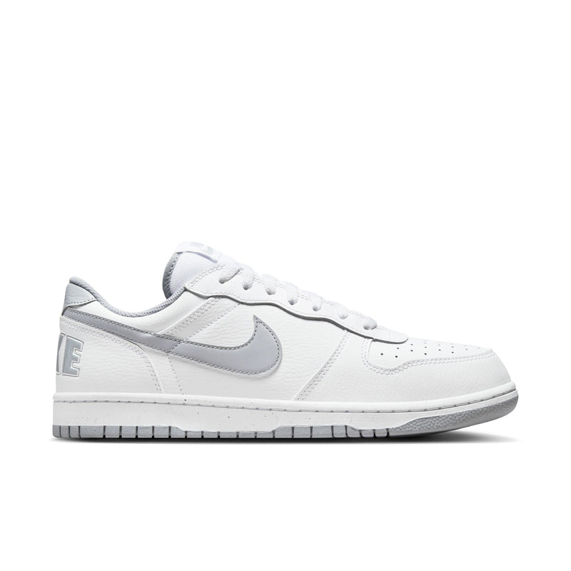 Nike low-top sneakers in white with Wolf Grey Swoosh and lace-up design