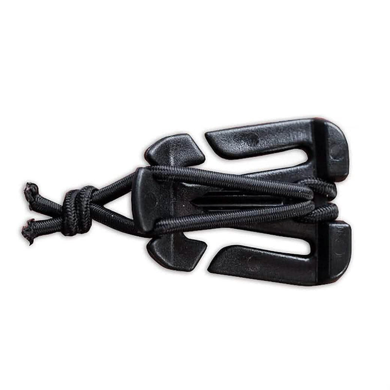 GORUCK black plastic sternum strap slider with paracord on white background