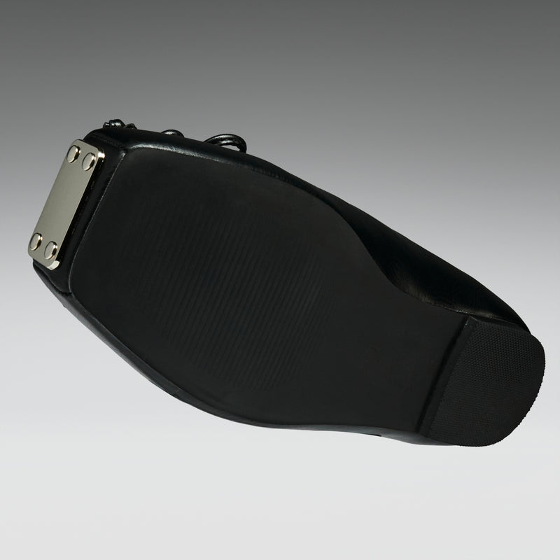 Black leather belt with silver buckle on a gradient gray background