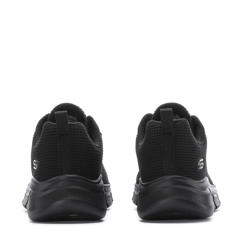 Women's black sneakers heel view with stitched panels and cushioned sole