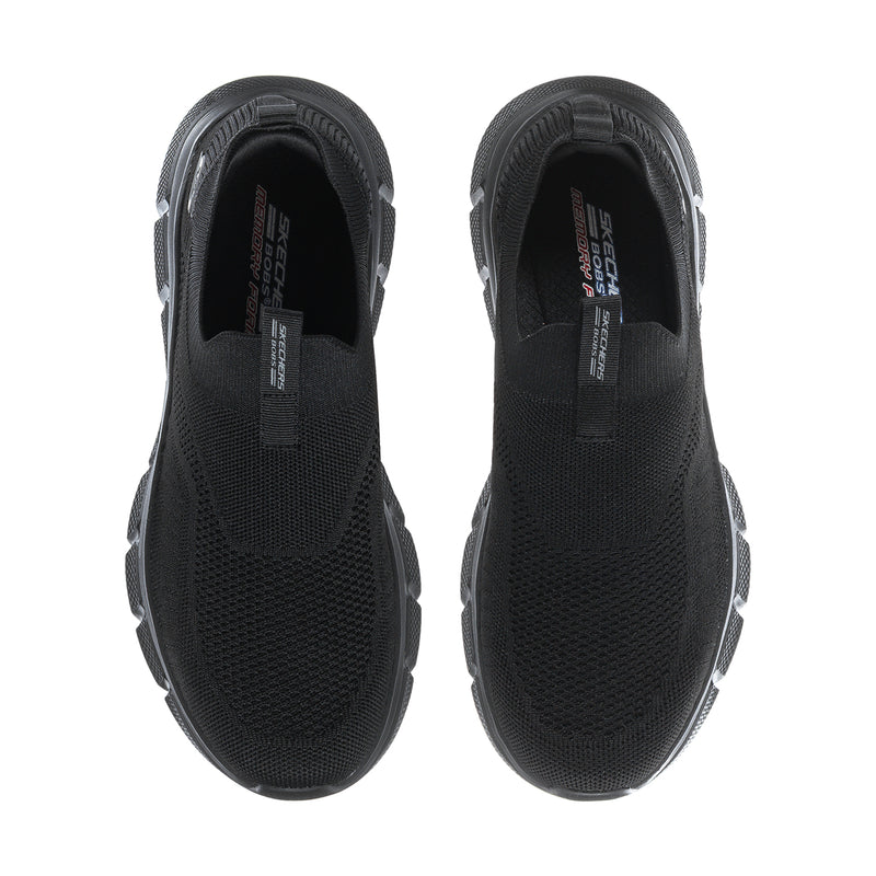 Pair of men's black slip-on shoes with padded heel collar and mesh upper