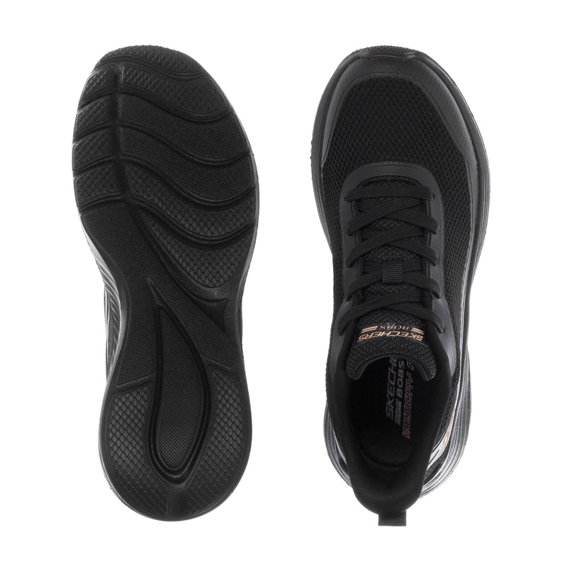Black athletic sneaker outsole and heel with tread pattern and lace-up opening
