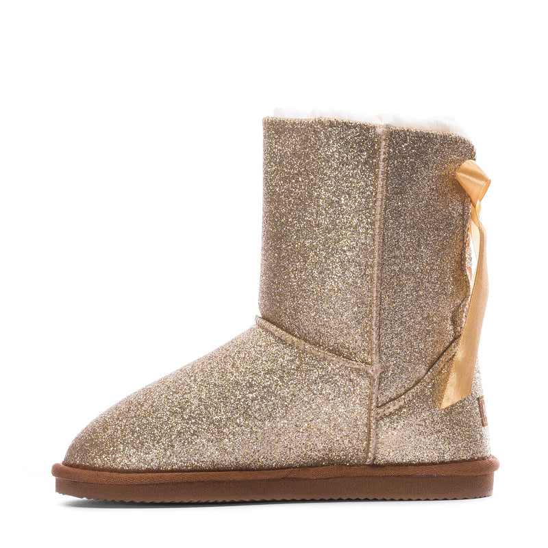 Kids gold glitter short boot with ribbon bow on the outer heel and brown sole