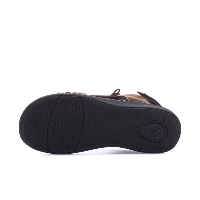 Men's dark tan sandals outsole view with tread pattern on black rubber sole