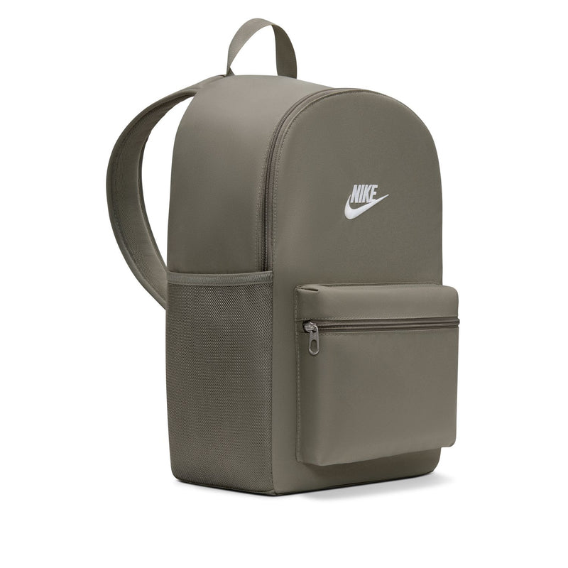 Nike Brasilia Heritage backpack side view with adjustable shoulder straps and front zip