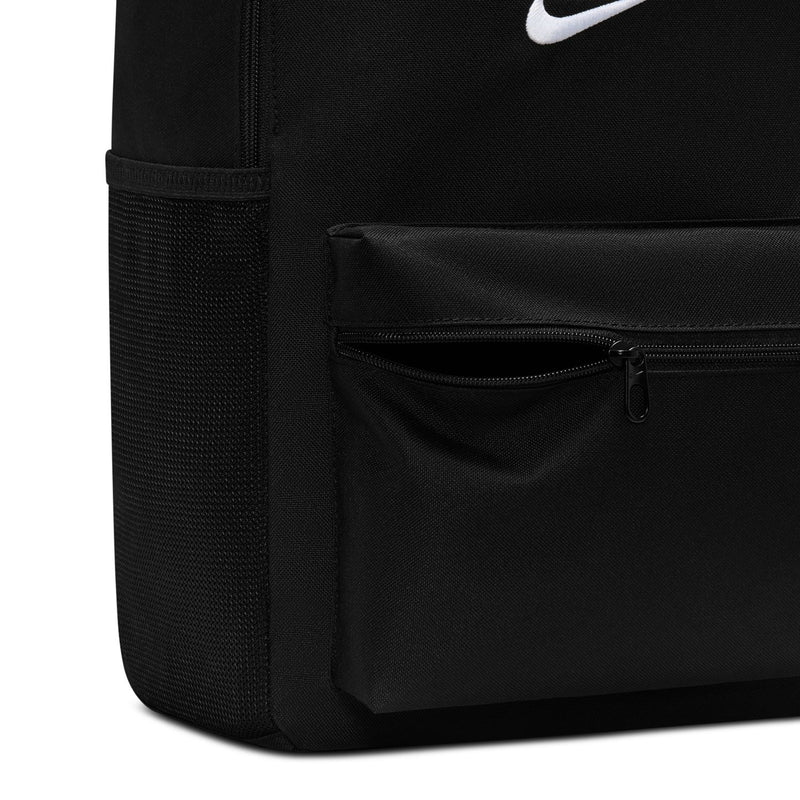 Black Nike backpack close-up of front zipper pocket and pull tabs