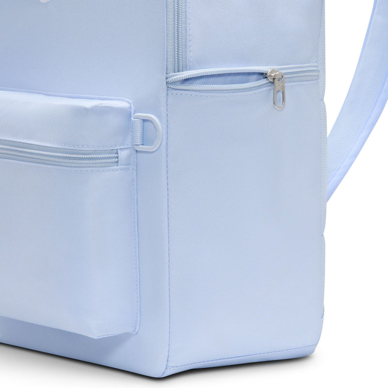 Light blue Nike backpack with side pocket and front zipper compartment