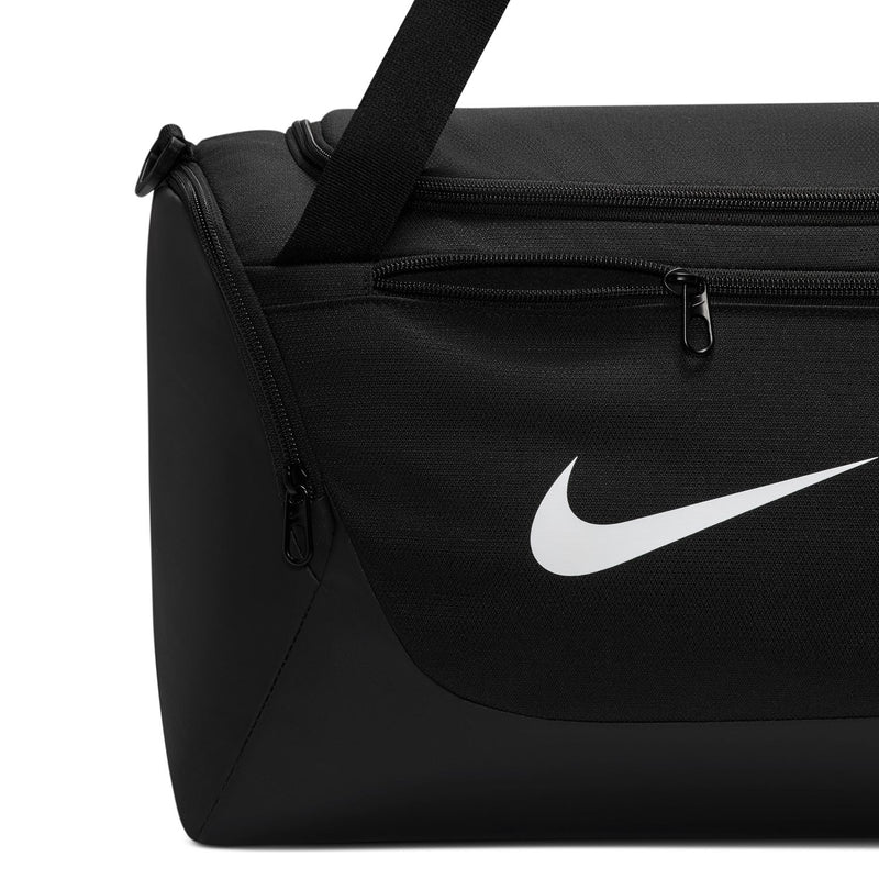 Black duffel bag side pocket with zipper and white Nike swoosh logo