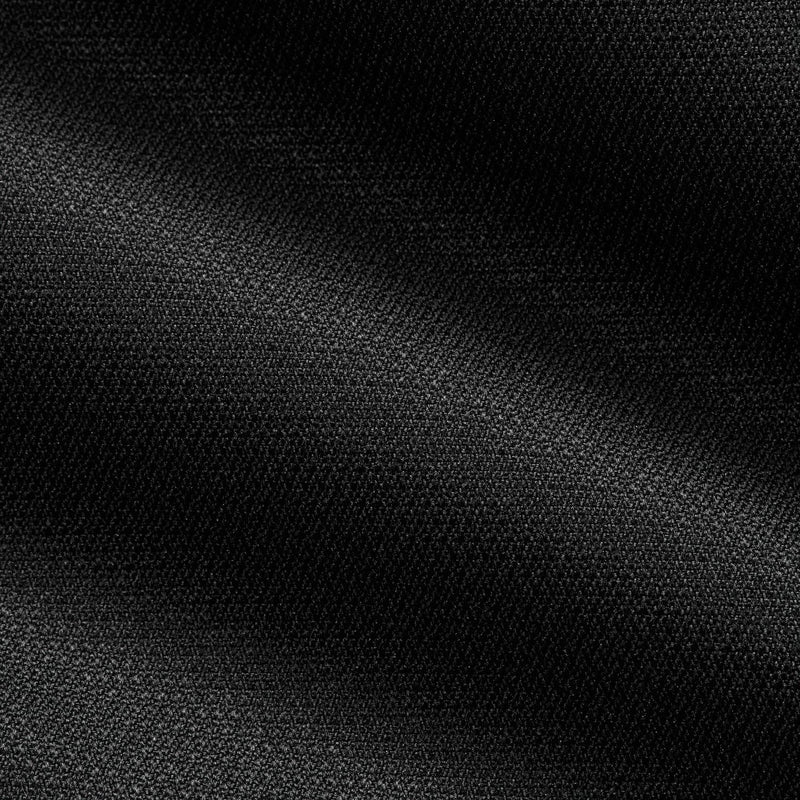 Black woven duffel fabric close-up texture