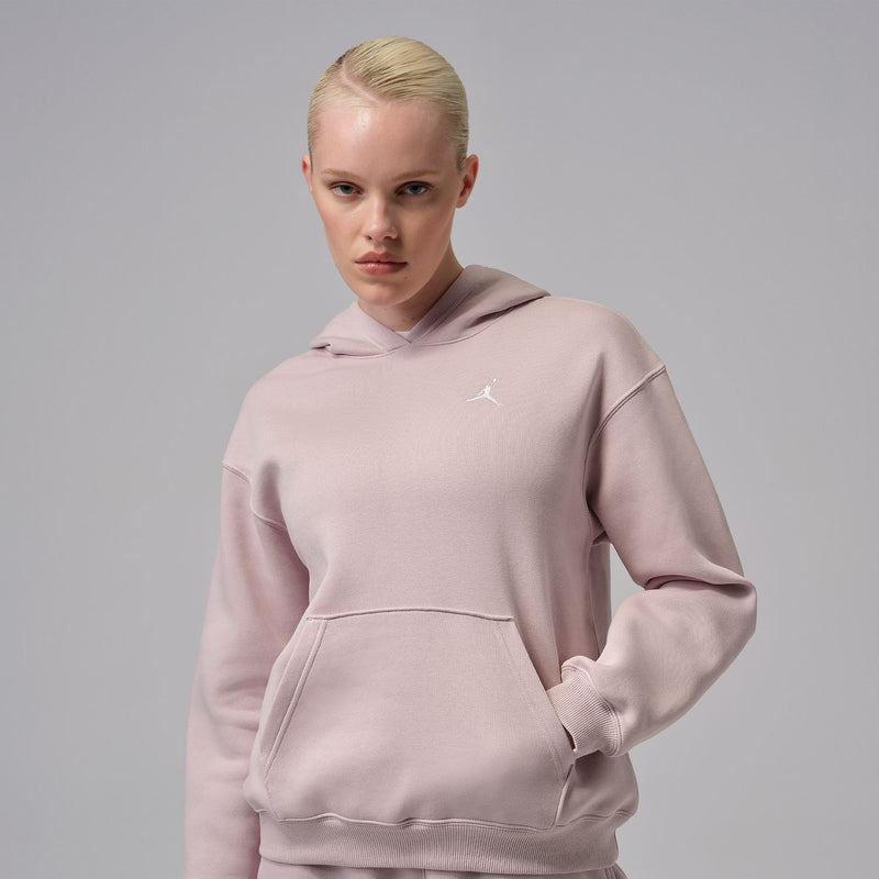 Women's pink fleece pullover hoodie with hood and small white Jordan logo