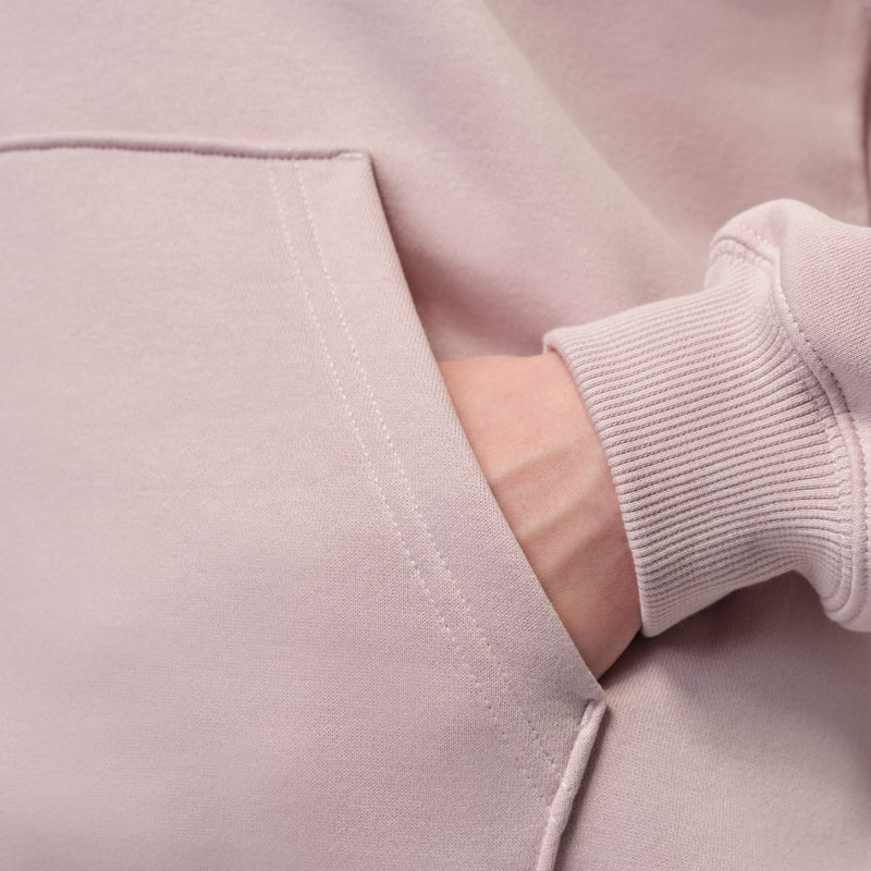 Pink fleece hoodie detail: kangaroo pocket and ribbed cuff