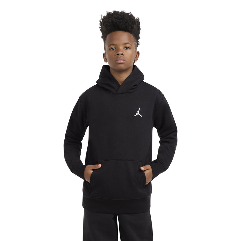 Youth black fleece pullover hoodie with hood and Jumpman logo, worn on model.