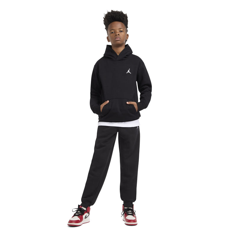 Youth black fleece pullover hoodie with hood and Jumpman logo, side view.