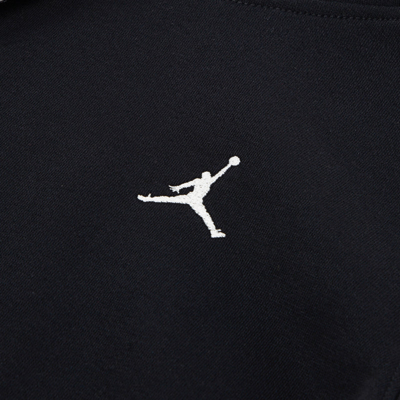 Jumpman logo on black youth fleece pullover hoodie chest.