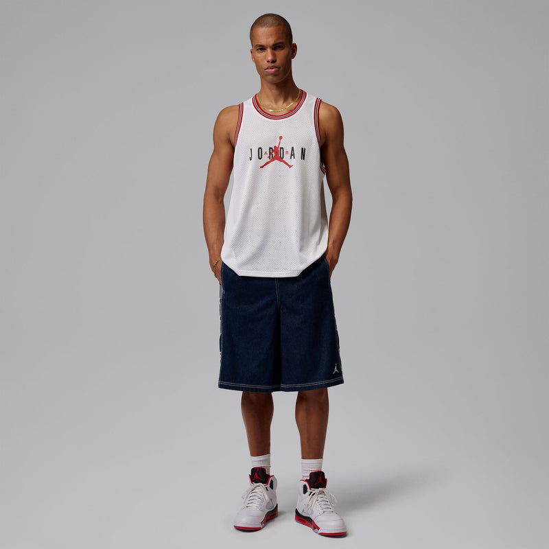 Men's white mesh basketball jersey with red trim and Jordan logo, front view