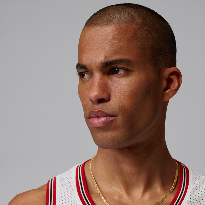 White mesh basketball jersey collar with red and black stripes, Jordan logo detail