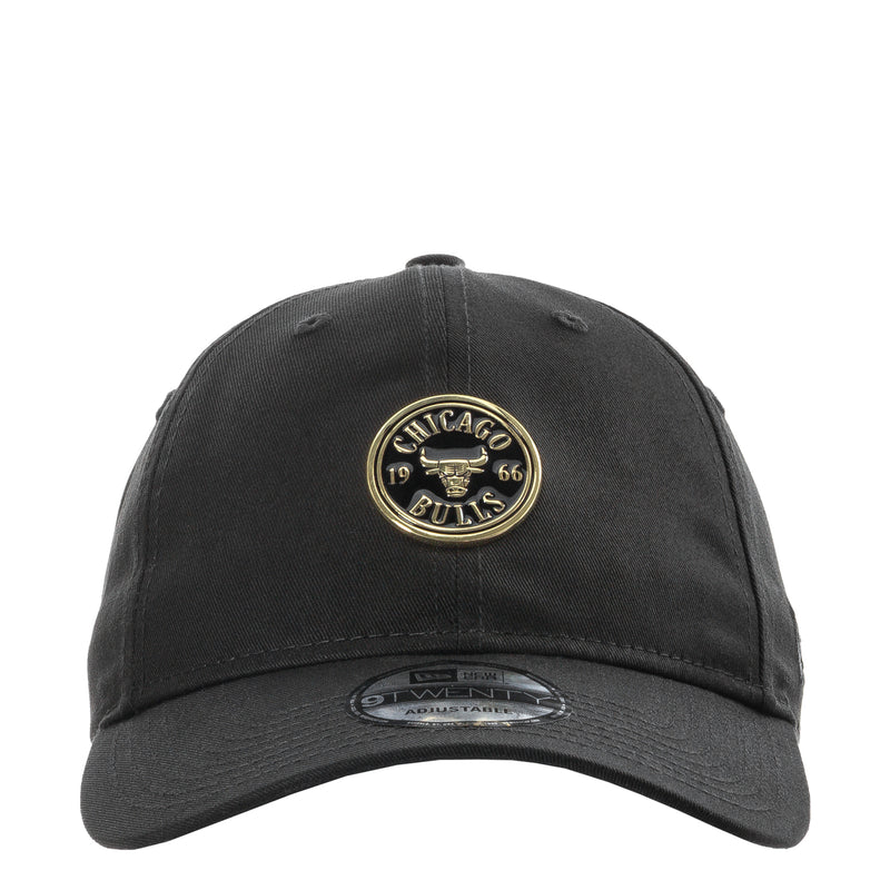 Black baseball cap with embroidered Chicago Bulls gold badge and curved brim