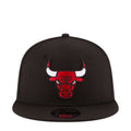 Black baseball cap with red-and-white bull head logo on the front panel