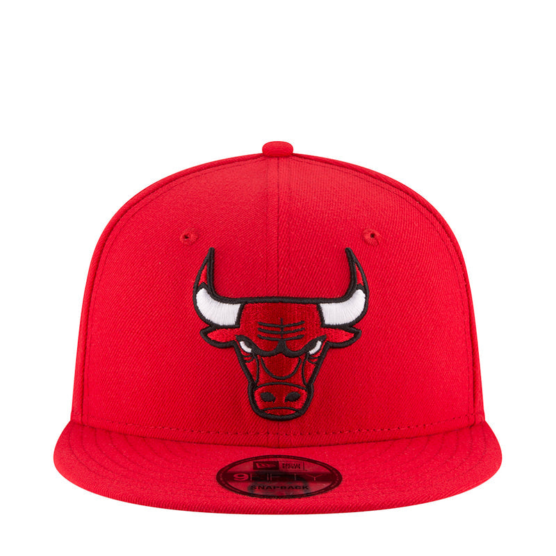 Red baseball cap with embroidered bull logo on the front and curved brim