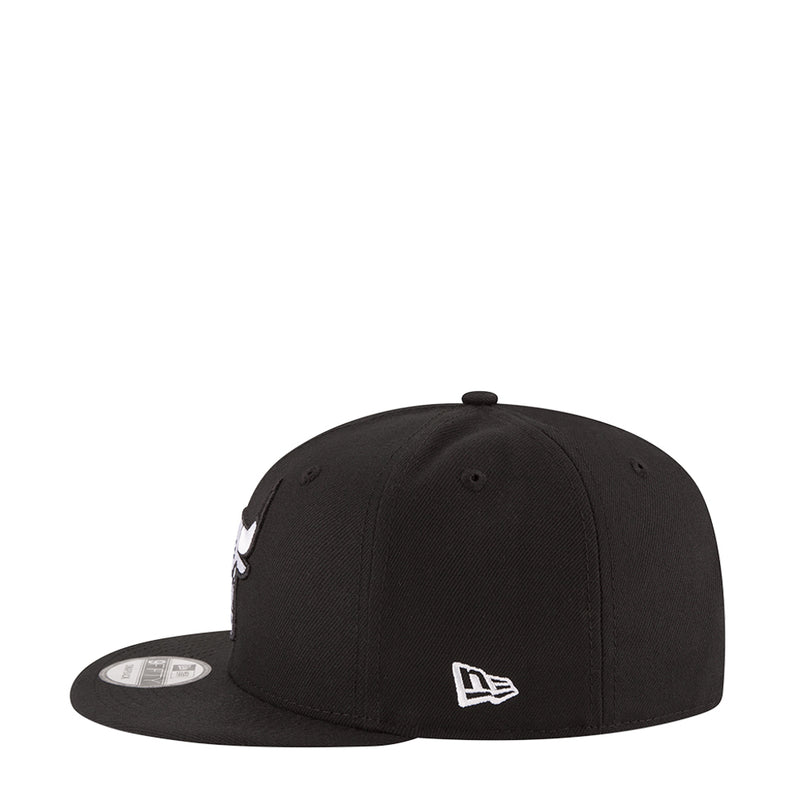 Black baseball cap with New Era flag logo on side