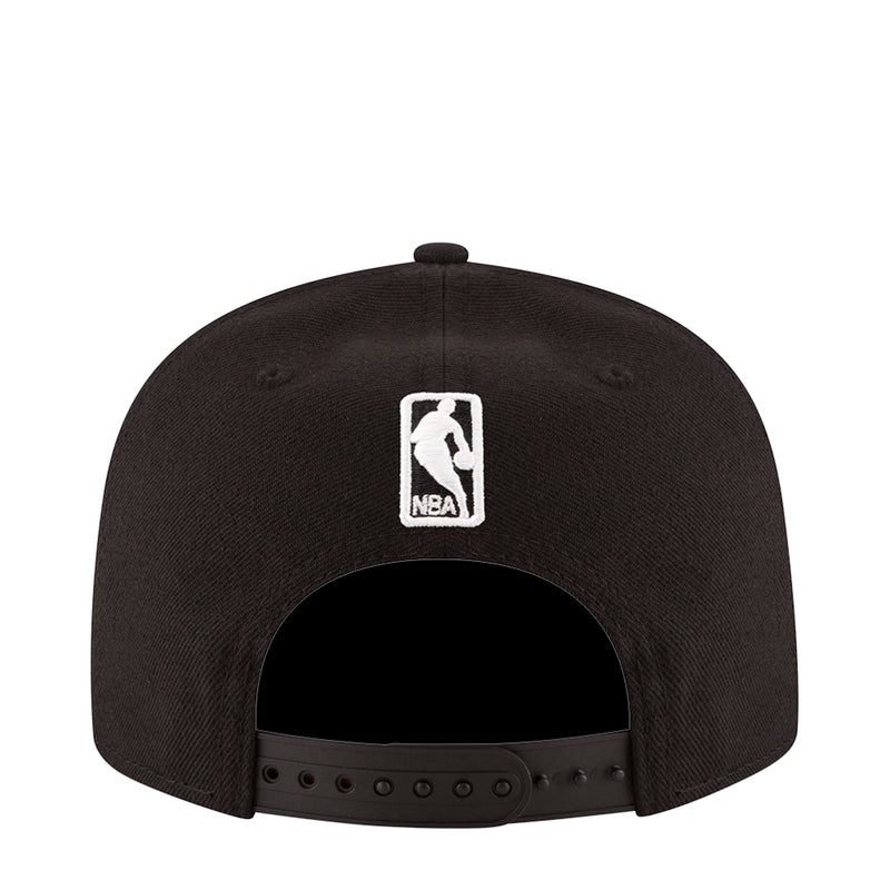 Black baseball cap with rectangular NBA logo patch on the back