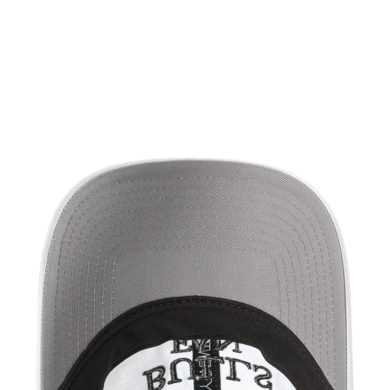 Gray underside of baseball cap with black New Era patch and stitching